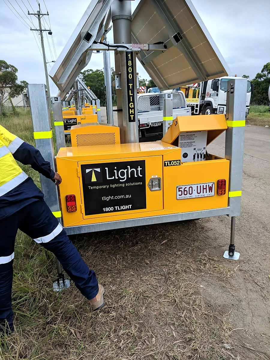 Technician working at an open T Light generator bay