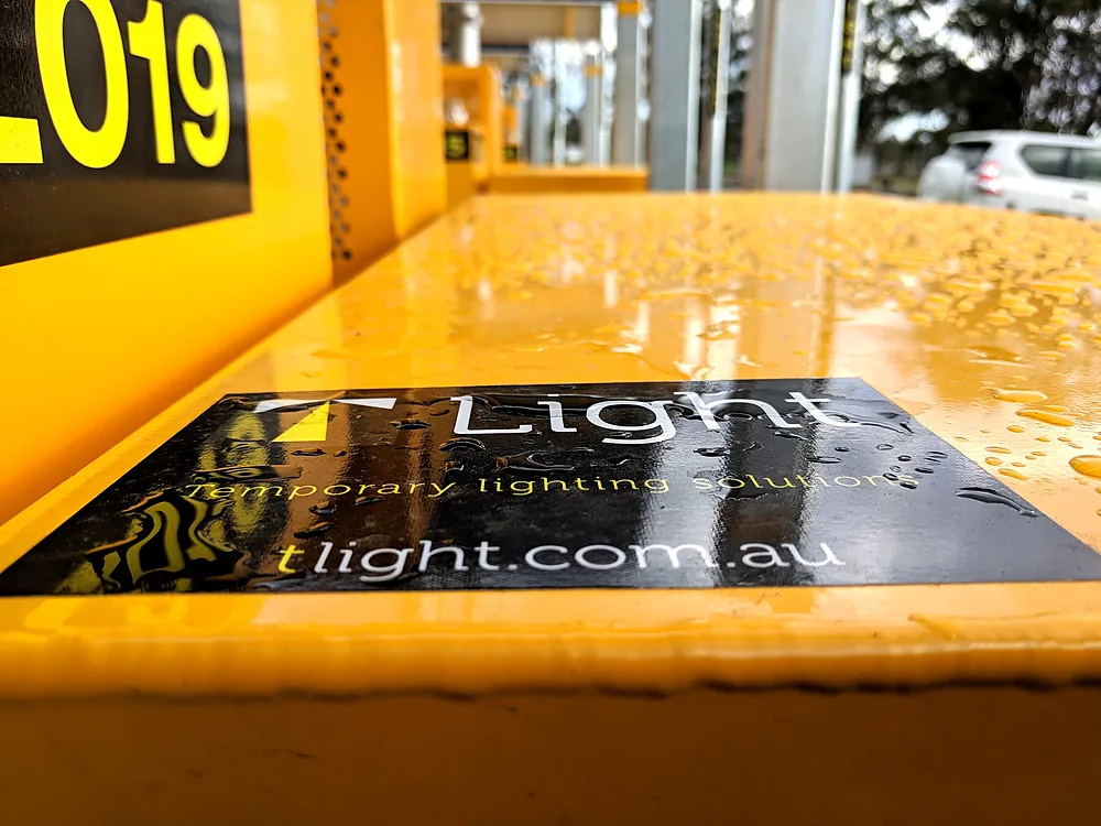 Close-up of the T Light logo on a unit after rain