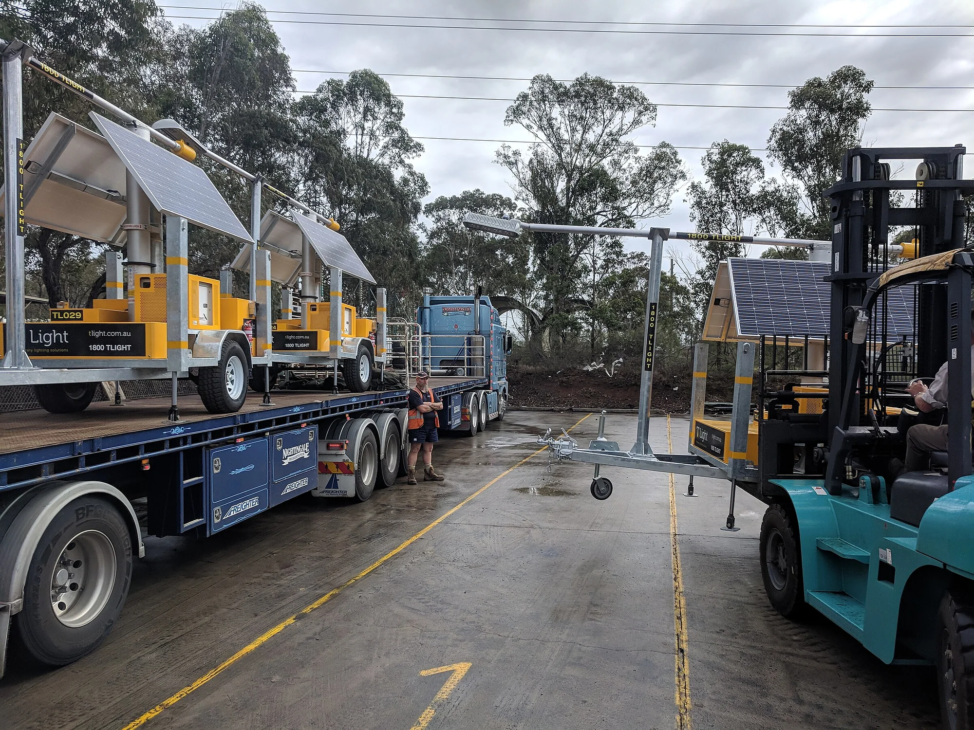 A T Light unit being loaded onto a truck by forklift